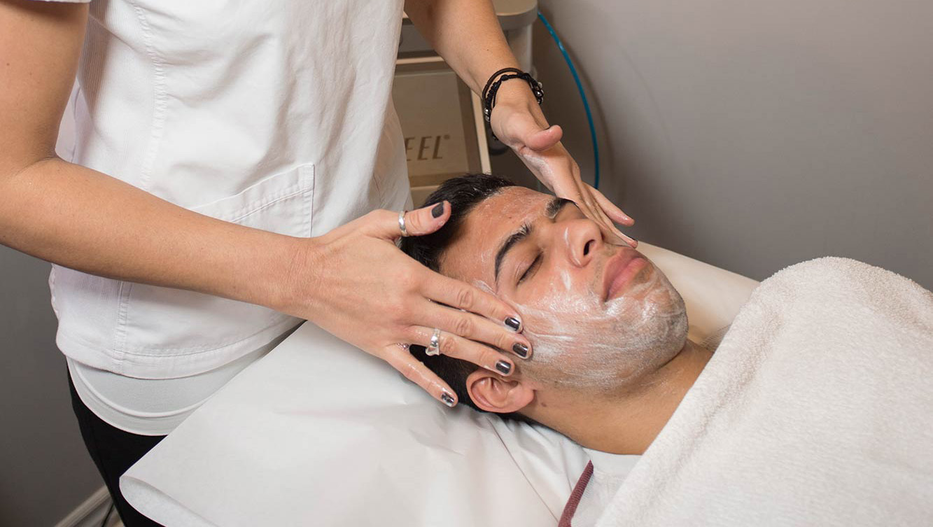 A photo of a chemical peel being applied.